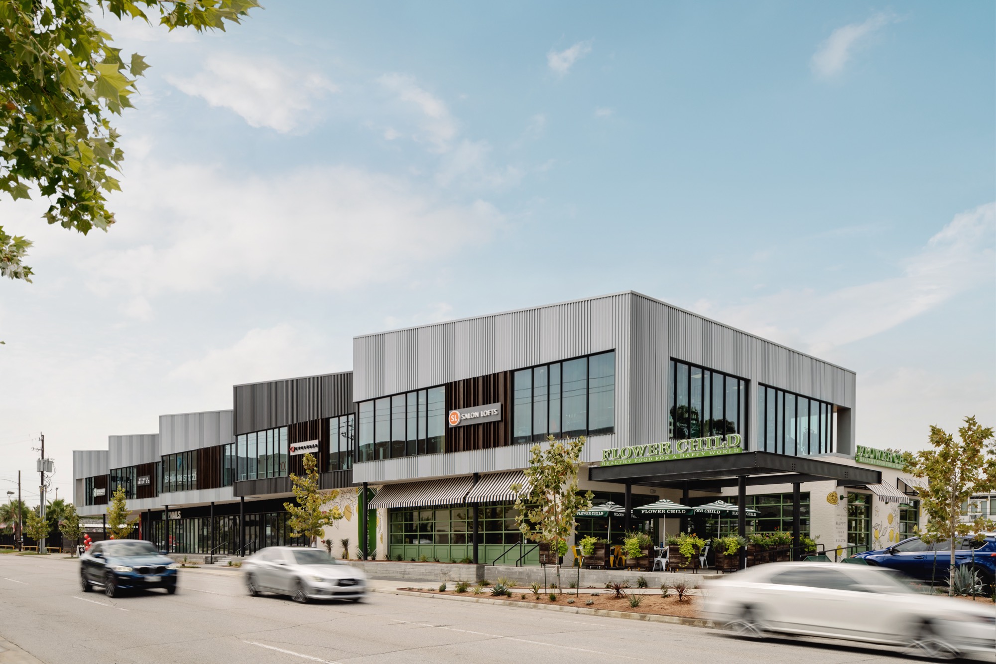 Two-story brick storefronts at Market at Houston Heights